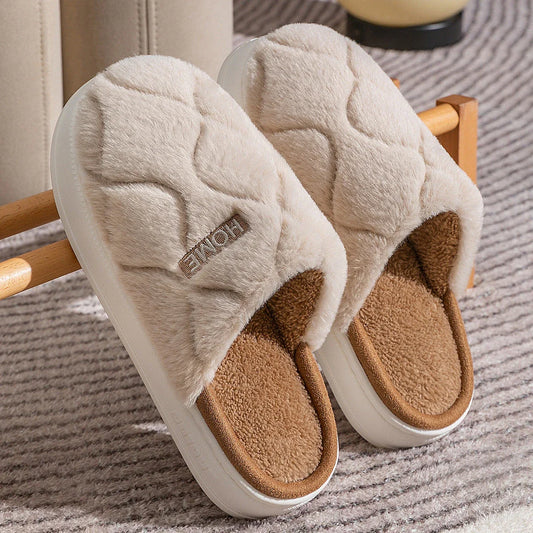 Plush slippers with soft, cushiony upper and durable PVC sole for cozy indoor comfort and traction