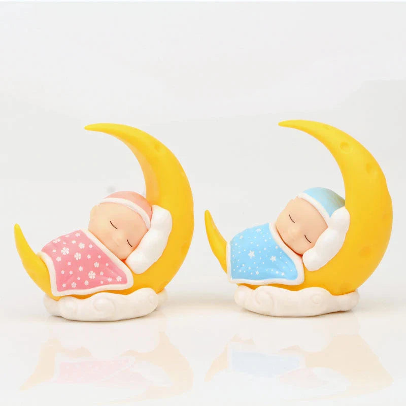 Adorable moon-themed cake toppers with sleeping baby design, perfect for kids' birthday parties and celebrations