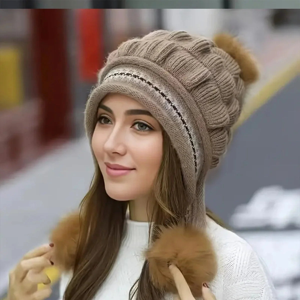 Knit fleece beanie with ear flaps and pompom in various colours for winter warmth