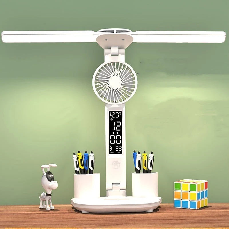 Foldable LED desk lamp with fan, thermometer, and pen holder on a tidy desk