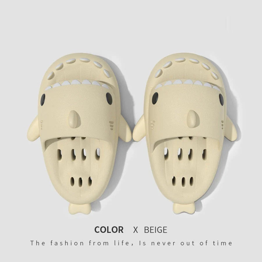 Fashionable shark-themed shower slides with drainage holes, featuring a realistic shark design, quick-drying EVA material, and non-slip traction.
