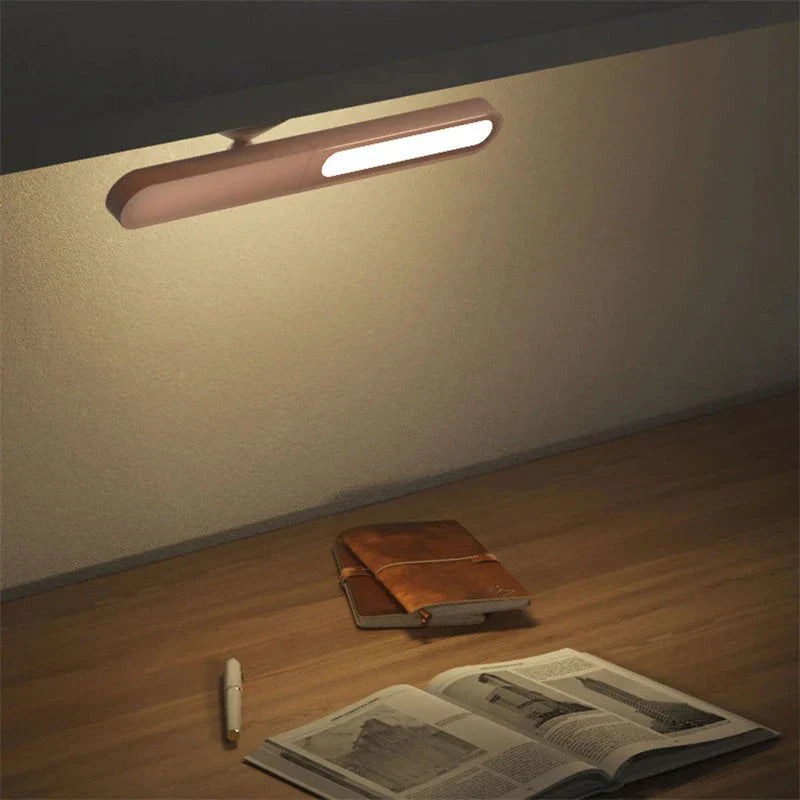Elegant wireless reading lamp with geometric design, touch controls, and USB charging for versatile home lighting