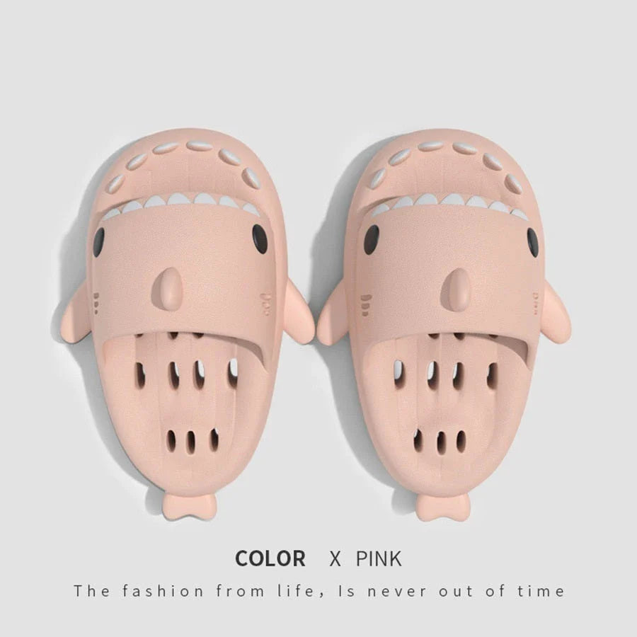Fashionable shark-themed shower slides with drainage holes, featuring a realistic shark design, quick-drying EVA material, and non-slip traction.