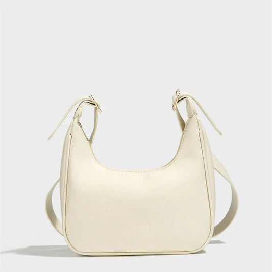 Stylish women's PU leather dumpling crossbody bag in black and white