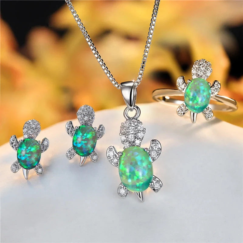 Stylish turtle pendant necklace with vibrant rainbow stones, perfect for women and children.