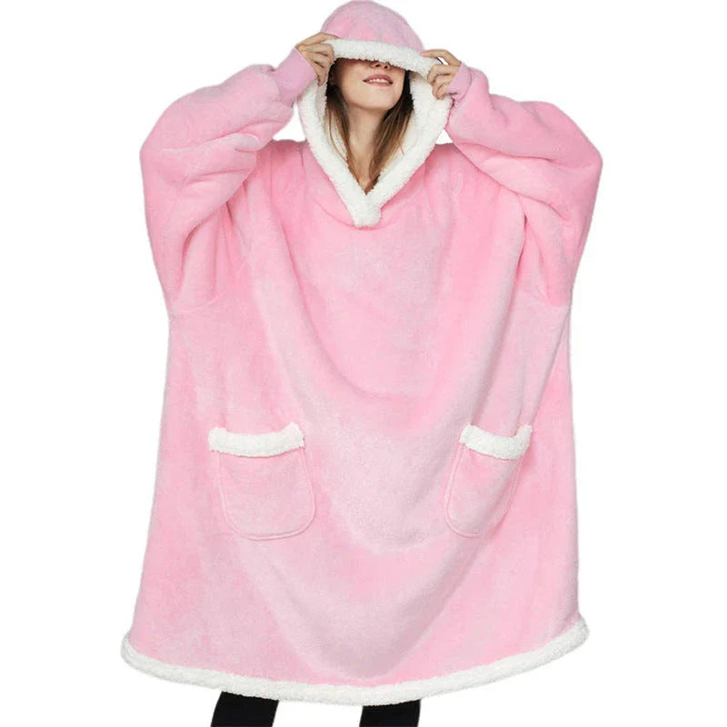 Comfy oversized TV hoodie blanket in various stylish colors, perfect for cozy movie nights and relaxation at home.