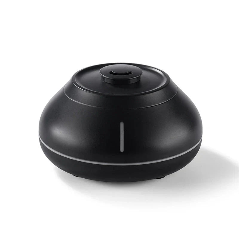 Aroma diffuser with flame-like effect, designed for relaxation and ambiance in home or office settings