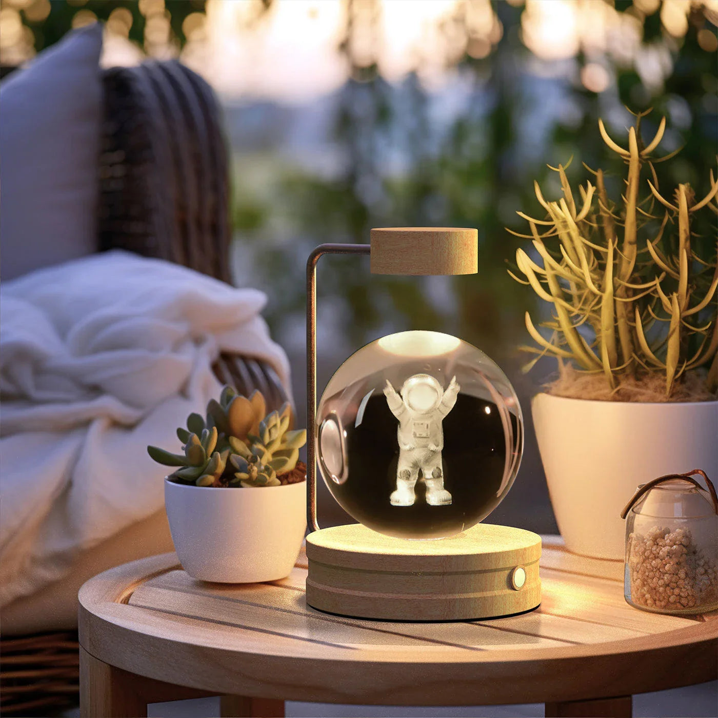 Enchanting crystal ball night light with cosmic designs, creating a warm and soothing ambiance in any room.