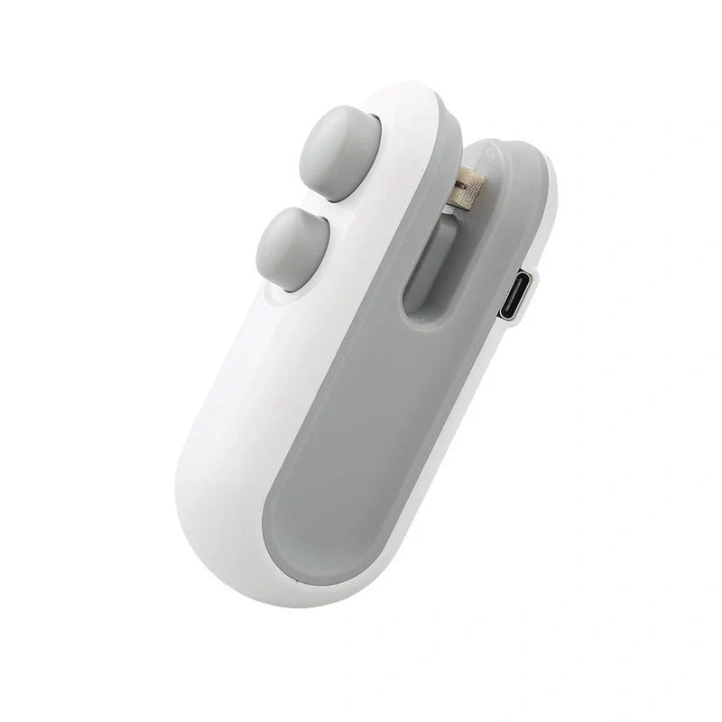 Compact USB rechargeable handheld vacuum sealer in white and blue