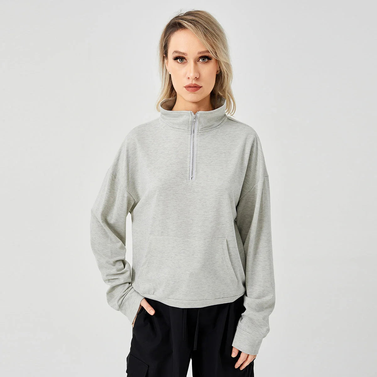 Women's pullover sweatshirt in white, grey, and brown, available in sizes S to XL