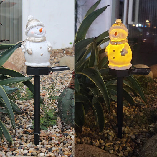 Solar-powered snowman garden light with automatic dusk-to-dawn illumination