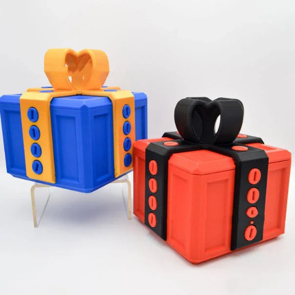 Clever Gag Gift Box - Unique 3D printed design in various colors with a humorous "trouble" concept for prank gifts and creative holiday presents