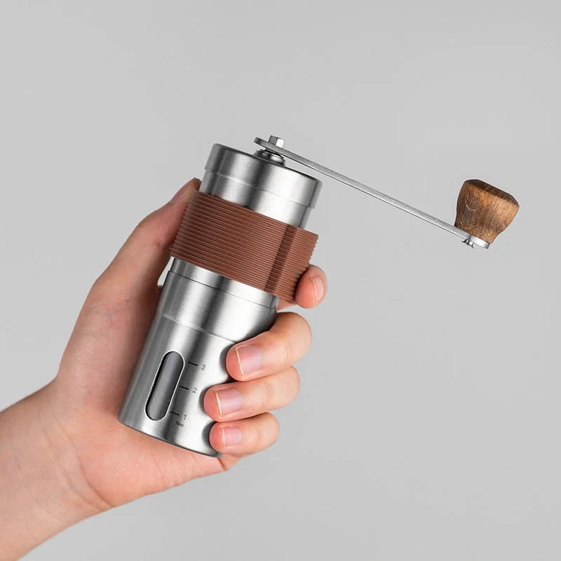 Portable hand coffee machine with stainless steel grinder and folding handle
