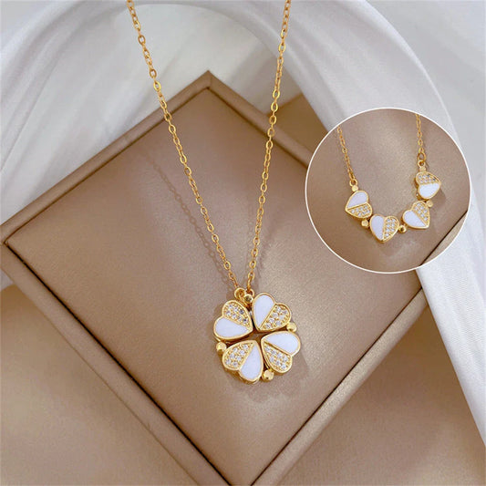 Luxe four-leaf clover pendant necklace crafted with stainless steel and crystal heart charm for women