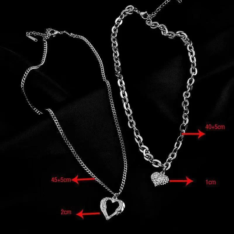 Titanium Steel Angel Wings Love Necklace with heart-shaped pendants and irregular folds design