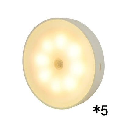 Motion-activated LED puck lights in warm and white color options, with various pack sizes and USB recharging
