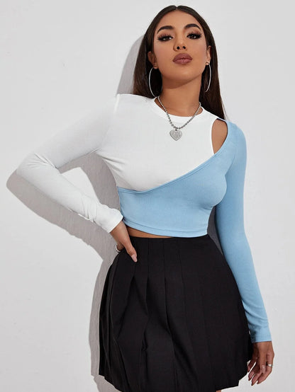 Stylish strapless cropped t-shirt in a trendy colorblock design, perfect for elevating any casual outfit.
