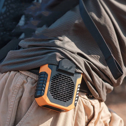 Portable waist fan with USB charging in green, black, and orange