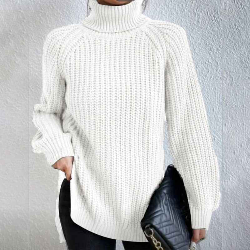 A stylish turtleneck pullover sweater with a unique split design, available in a variety of classic colours and sizes.