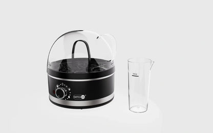 Compact plug-in steam boiler for cooking perfect eggs with adjustable settings