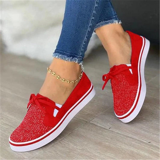 Women's white lace-up canvas flat shoes with cross straps