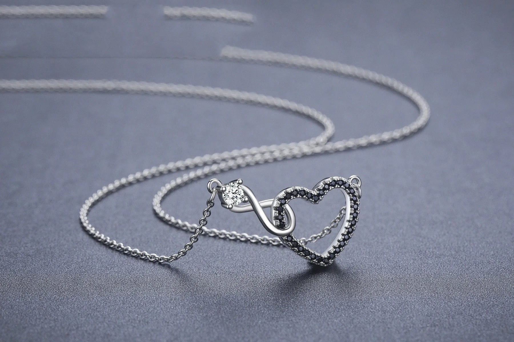Hollow heart-shaped zircon necklace with titanium steel pendant in black