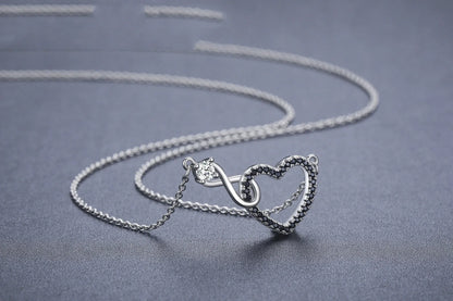 Hollow heart-shaped zircon necklace with titanium steel pendant in black
