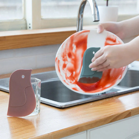 Penguin-shaped soft blade kitchen scraper for efficient cleaning