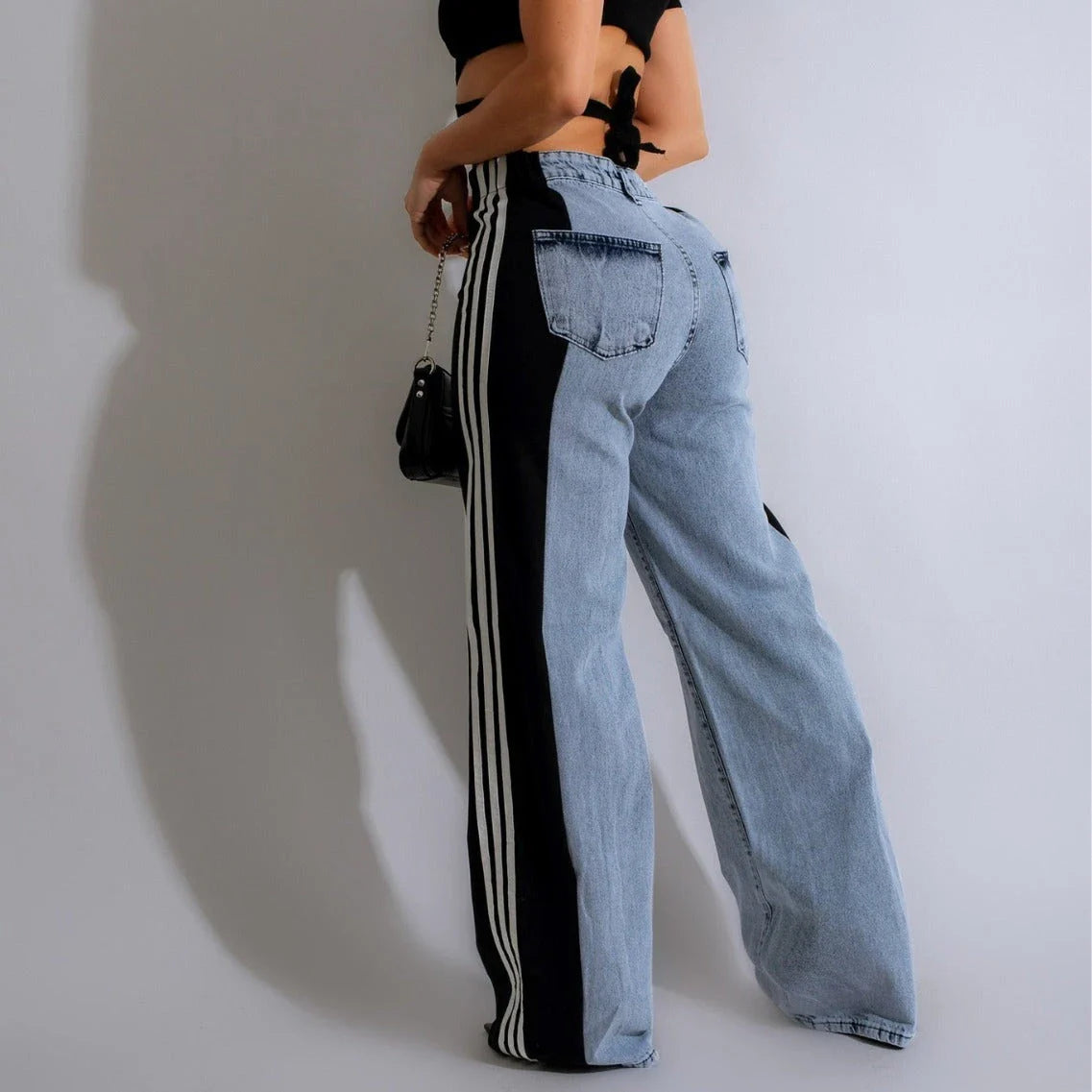 Stylish high-waist denim pants with patchwork details, available in a range of trendy color combinations