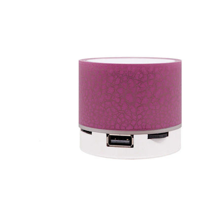 Portable Bluetooth speaker with colorful changing lights, high-quality audio, and durable design for on-the-go use