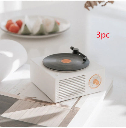 Retro Bluetooth Mini Speaker with USB Port in vintage design, perfect for wireless music streaming.