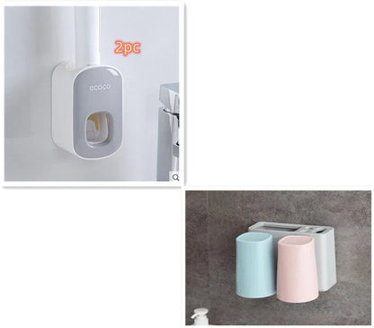 Wall-mounted automatic toothpaste dispenser with storage cups for toothbrush and bathroom accessories