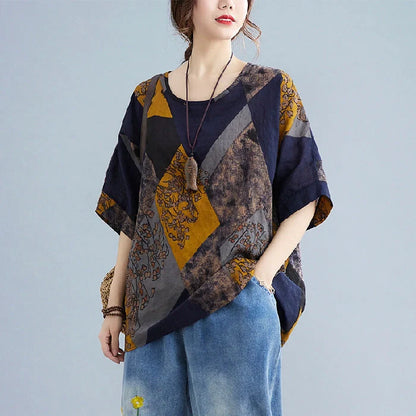 Stylish loose fit women's t-shirt in retro print with vibrant colours of yellow, red, and brown