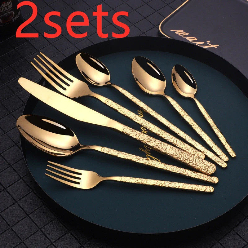 Premium steak cutlery set with embossed textured handles, made of durable stainless steel for a refined dining experience.