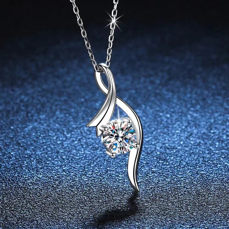Elegant 925 sterling silver necklace with a sparkling moissanite diamond pendant, showcasing exceptional British craftsmanship.