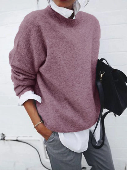 A long sleeve knitted jumper in various solid colours, including light gray, black, khaki, blue, and pink