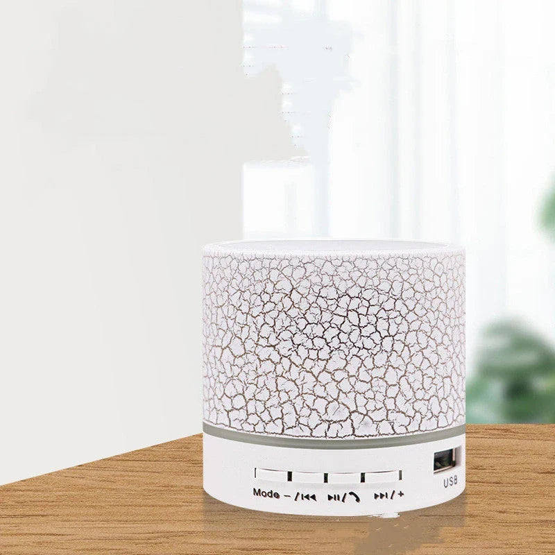 Portable Bluetooth speaker with colorful changing lights, high-quality audio, and durable design for on-the-go use