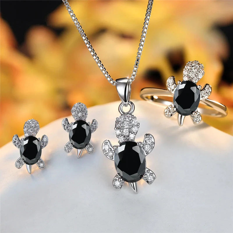 Stylish turtle pendant necklace with vibrant rainbow stones, perfect for women and children.