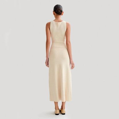 Sophisticated knit sleeveless dress with a slim, figure-flattering silhouette in apricot and blue colors