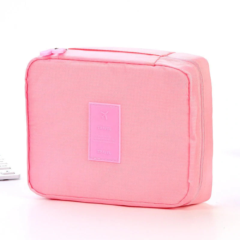 Premium toiletry bag with waterproof divider, multi-grid pockets, and durable Oxford cloth construction