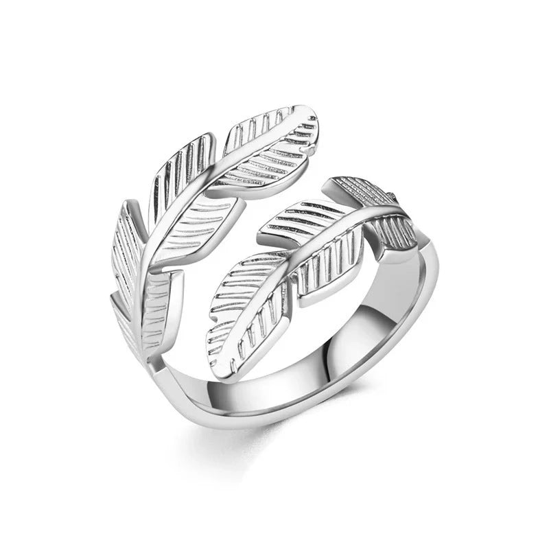 Feather-themed titanium steel open ring in gold and silver colours, with an adjustable design and elegant geometric shape
