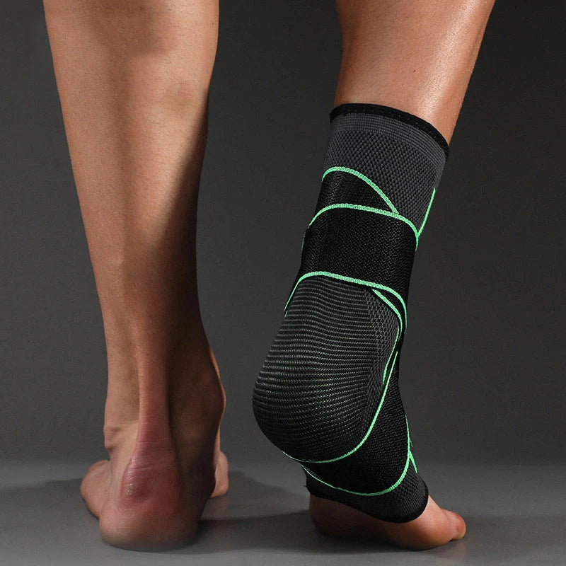 Sports compression ankle protector in black, green, and orange colours
