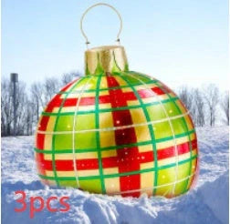 Vibrant inflatable Christmas baubles in a variety of colours and patterns, perfect for outdoor holiday decoration
