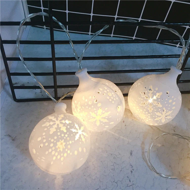 Navidad LED String Lights in Snowman, Snow Ball, and Santa Claus designs for festive decorations