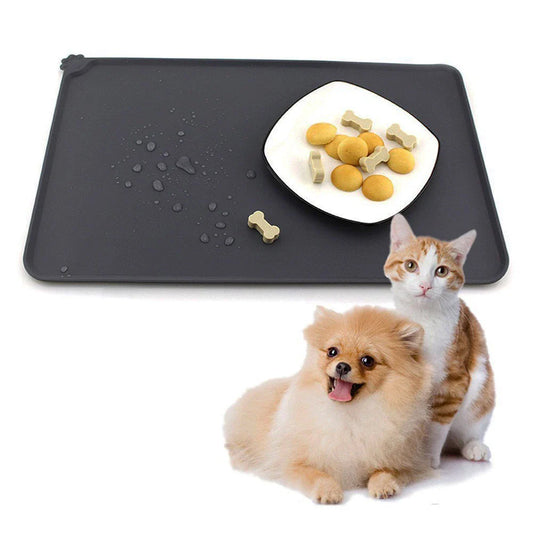 Spill-proof pet food mat made of durable silicone with non-slip base and raised edges to prevent messes
