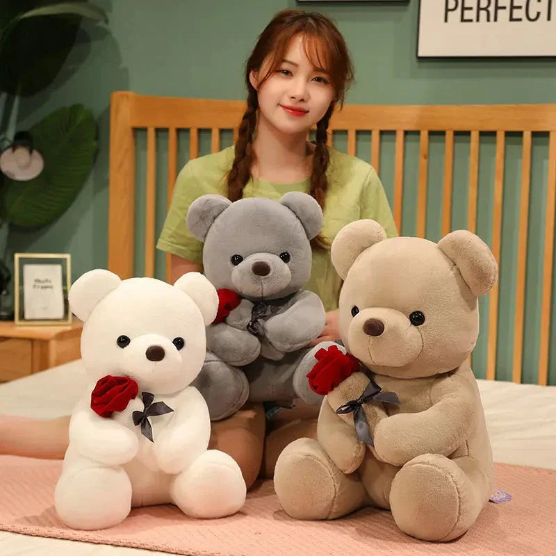 Soft and huggable teddy bear plush pillow in brown, beige, and grey colors