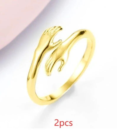 Adjustable Alloy Hands Hug Ring in silver and gold, stylish unisex jewelry
