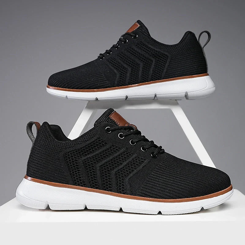 Men's black lace-up mesh sneakers with round toe design