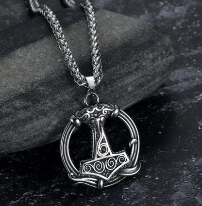 Vintage Norse rune necklaces for men, featuring a range of intricate Viking symbols and designs crafted from premium stainless steel