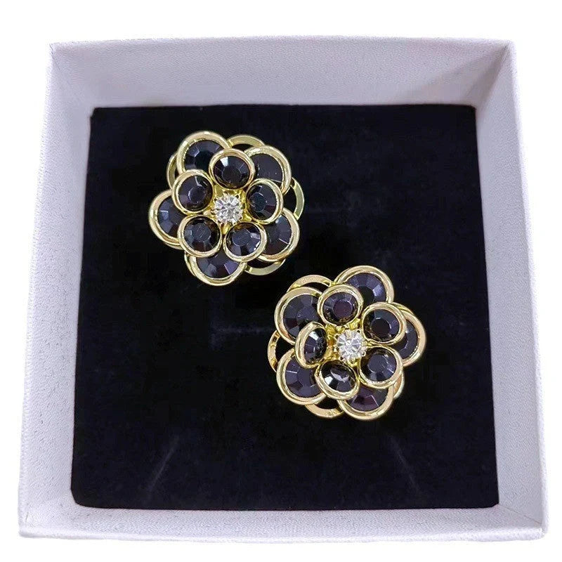Small flower stud earrings for women in colour, black, and white options - sweet and trendy design